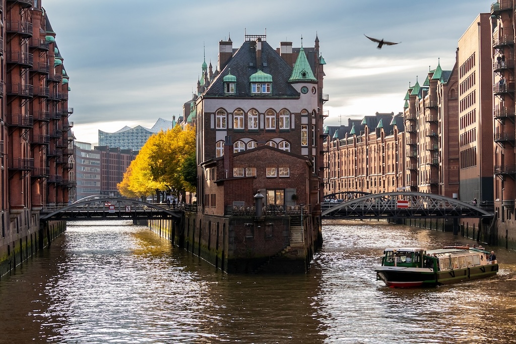 a view of the famous harbor in Hamburg seen from the river