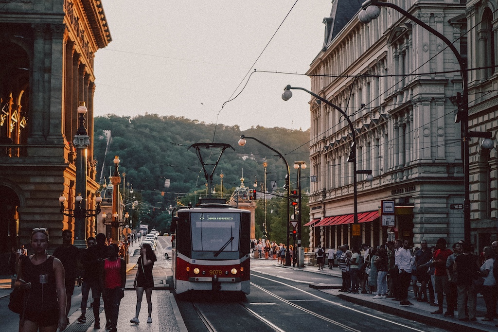 Narodni Street in New Town of Prague at the hour of sunset with a street car coming approaching